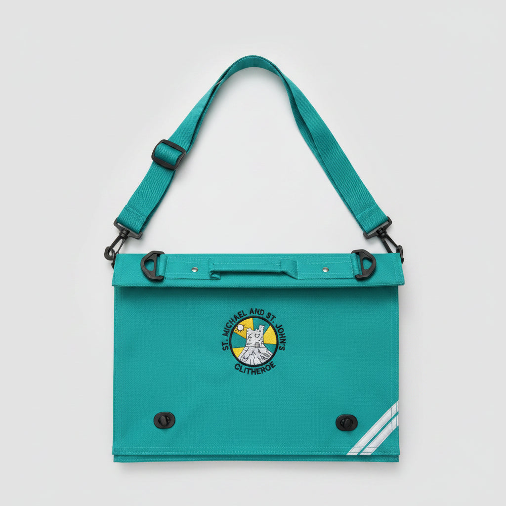 A turquoise canvas utility bag with a matching shoulder strap, featuring a circular embroidered crest for St. Michael and St John Primary School in Clitheroe